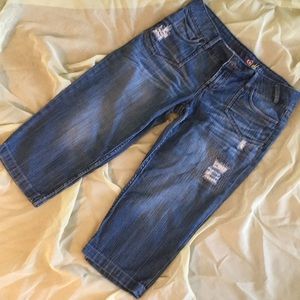 Distressed denim capris